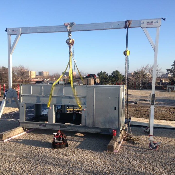 Crane lifting new unit at Thermal Concepts